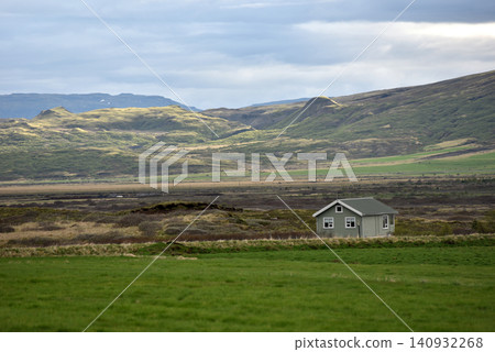 Solitary house nestled in the mossy hills of Arnarstapi Iceland Solitary house nestled in the mossy hills of Arnarstapi Iceland 140932268