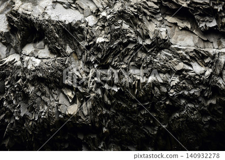 Sharp fragmented textures of heavily weathered volcanic rock face in Iceland Sharp fragmented textures of heavily weathered volcanic rock face in Iceland 140932278
