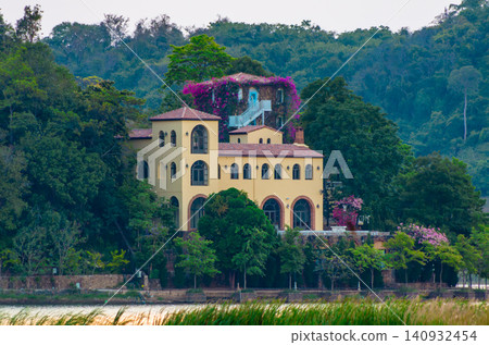One Chi Chan mansion viewed from the water in Pattaya, Thailand One Chi Chan mansion viewed from the water in Pattaya, Thailand 140932454