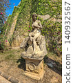 Classical stone sculpture of female figure with sheep in garden at Castello Di Bellagio Pattaya Thailand 140932567