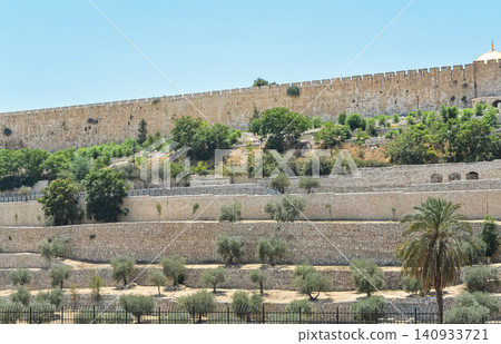 Temple Mount of the Old City of Jerusalem, Israel. The Eastern Wall of the Old City of Jerusalem and the walled-up Golden Gate. Travel photo, nobody Temple Mount of the Old City of Jerusalem, Israel. The Eastern Wall of the Old City of Jerusalem and the walled-up Golden Gate. Travel photo, nobody 140933721