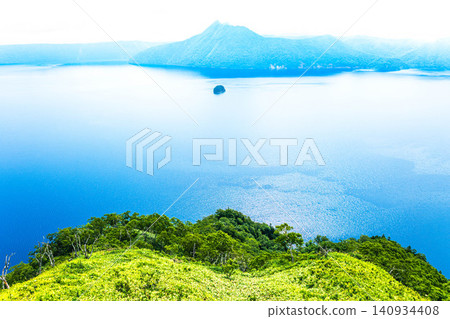 Lake Mashu, located within Akan Mashu National Park in Teshikaga Town, Hokkaido, offers a refreshing summer experience. Lake Mashu, located within Akan Mashu National Park in Teshikaga Town, Hokkaido, offers a refreshing summer experience. 140934408