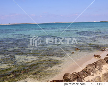 Beautiful clear, shallow waters and summer seascape of Senaga Island, Okinawa | Background material for travel, tourism, web, social media, and advertising 140934415
