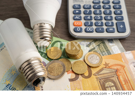 Cost of electric utilities with light bulb for payment. Cost of electric utilities with light bulb for payment. 140934457
