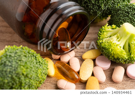 Drug with broccoli vegetable for healthy food. Drug with broccoli vegetable for healthy food. 140934461