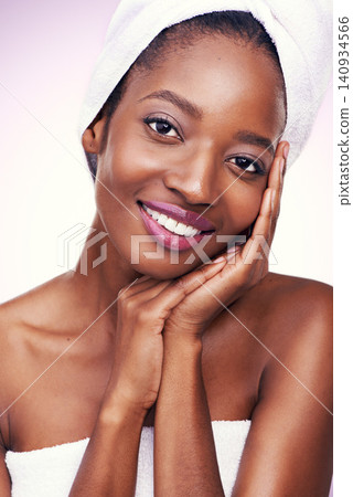 Woman, portrait and skin care in studio with beauty, dermatology and facial glow on a white background. Portrait of young model or African person in towel and smile for hygiene, cosmetics and makeup 140934566