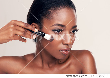 Beauty, makeup and face of black woman with brush in studio with cosmetic application tool. Skincare, blush and cosmetics, facial skin care model and luxury contour powder product on white background Beauty, makeup and face of black woman with brush in studio with cosmetic application tool. Skincare, blush and cosmetics, facial skin care model and luxury contour powder product on white background 140934639