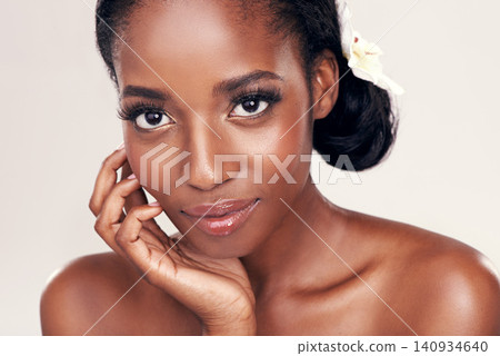 Woman, portrait and makeup for cosmetics in studio with beauty, natural glow or self care with confidence. Model, african person or face for wellness, facial treatment or skincare on white background Woman, portrait and makeup for cosmetics in studio with beauty, natural glow or self care with confidence. Model, african person or face for wellness, facial treatment or skincare on white background 140934640