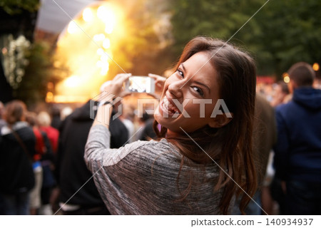 Woman, music festival and cellphone picture of stage entertainment, party concert or crowd audience. Female person, mobile device and performance rock event or rave, photography or dj celebration 140934937