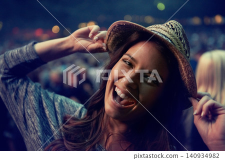 Happy woman, portrait and face at music festival party, event or DJ concert for outdoor night. Excited female person smile in evening crowd or audience at carnival, performance or summer fest outside Happy woman, portrait and face at music festival party, event or DJ concert for outdoor night. Excited female person smile in evening crowd or audience at carnival, performance or summer fest outside 140934982