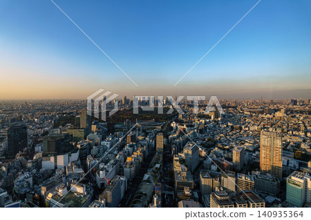 A panoramic view of Shinjuku Gyoen National Garden and the skyscrapers of Shinjuku at dusk. A panoramic view of Shinjuku Gyoen National Garden and the skyscrapers of Shinjuku at dusk. 140935364