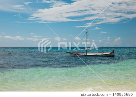 Boat in tropical blue sun sea. Boat in tropical blue sun sea. 140935690