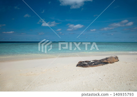A beautiful and empty beach in a tropical desert island A beautiful and empty beach in a tropical desert island 140935793