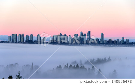 Metrotown Cityscape with Skyscrapers Flying in the Sky. Rising Above a Dense Low Fog Metrotown Cityscape with Skyscrapers Flying in the Sky. Rising Above a Dense Low Fog 140936478
