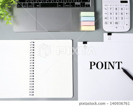 Business materials featuring a laptop, notebook, and calculator, inspired by the concept of "POINT." Business materials featuring a laptop, notebook, and calculator, inspired by the concept of "POINT." 140936761