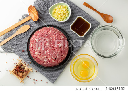 chinese Dumpling Filling Ingredients, Ground Pork Preparation with Seasonings chinese Dumpling Filling Ingredients, Ground Pork Preparation with Seasonings 140937162