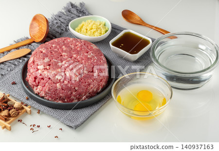 chinese Dumpling Filling Ingredients, Ground Pork Preparation with Seasonings chinese Dumpling Filling Ingredients, Ground Pork Preparation with Seasonings 140937163