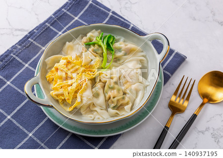 pork Wontons in Clear Broth, Traditional Chinese Dumpling Soup 140937195