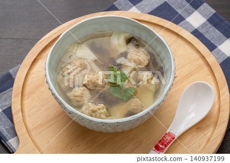 chinese Three Fresh Wontons in Light Broth, Traditional Dumpling Soup chinese Three Fresh Wontons in Light Broth, Traditional Dumpling Soup 140937199