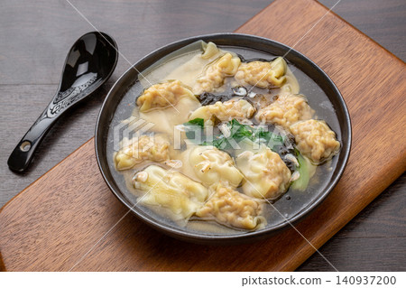 chinese Three Fresh Wontons in Light Broth, Traditional Dumpling Soup chinese Three Fresh Wontons in Light Broth, Traditional Dumpling Soup 140937200