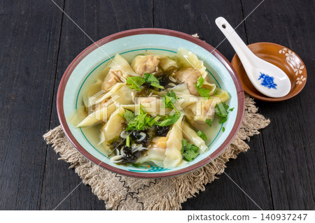 shanghai Style Wontons in Light Broth, Traditional Chinese Dumplings shanghai Style Wontons in Light Broth, Traditional Chinese Dumplings 140937247