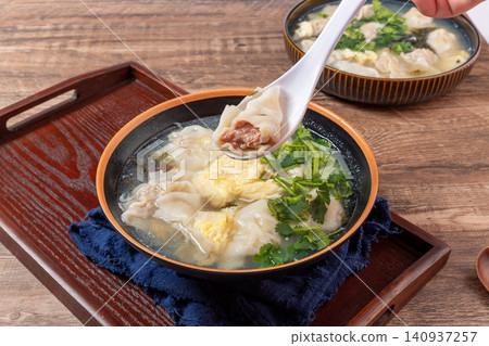 beef Wontons in Water Chestnut Soup, Traditional Chinese Dumpling Soup beef Wontons in Water Chestnut Soup, Traditional Chinese Dumpling Soup 140937257