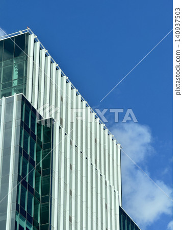 Contemporary Building Facade With Vertical Slats Design Contemporary Building Facade With Vertical Slats Design 140937503