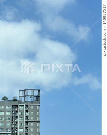 Minimalist Crop Of Contemporary Condominium Facade Against Sky. Minimalist Crop Of Contemporary Condominium Facade Against Sky. 140937517