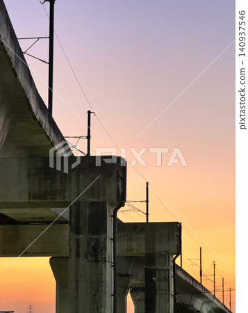 Urban Sky Train Track Structure Silhouette During Golden Hour Sunset Urban Sky Train Track Structure Silhouette During Golden Hour Sunset 140937546