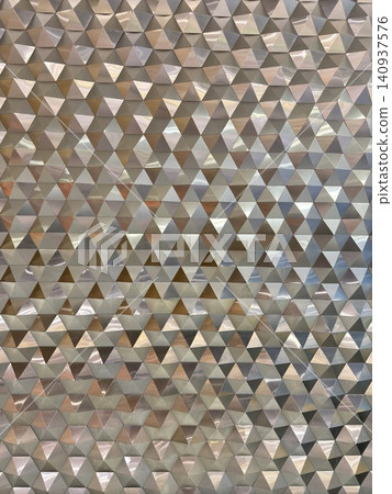 Wide Abstract Pattern Display Of Textured Triangular Wall. Wide Abstract Pattern Display Of Textured Triangular Wall. 140937576