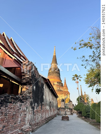 Nostalgic Brick Pathway Leading To Ancient Ayutthaya Stupa Nostalgic Brick Pathway Leading To Ancient Ayutthaya Stupa 140937621