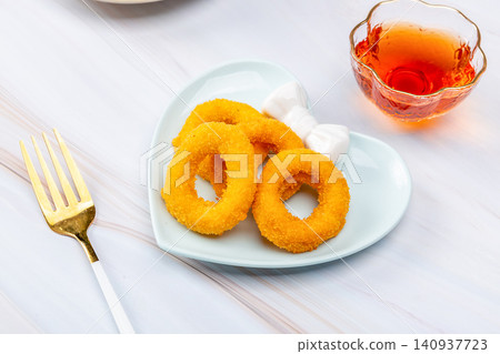 deep Fried Crispy Onion Rings, Golden Crunchy Breaded Onion Appetizer deep Fried Crispy Onion Rings, Golden Crunchy Breaded Onion Appetizer 140937723
