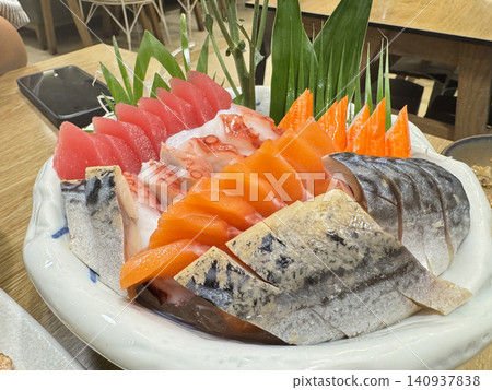 Close Composition Of Fresh Assorted Sliced Raw Fish Sashimi. Close Composition Of Fresh Assorted Sliced Raw Fish Sashimi. 140937838