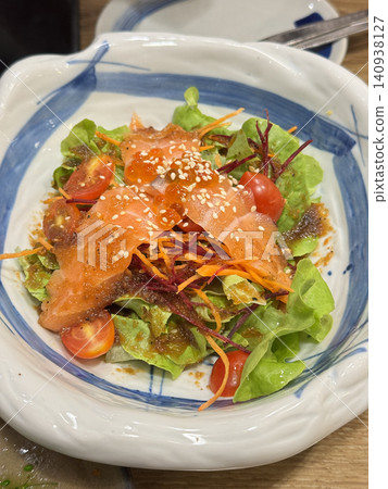 Fresh Salmon Salad Bowl With Japanese Dressing And Tobiko Fresh Salmon Salad Bowl With Japanese Dressing And Tobiko 140938127