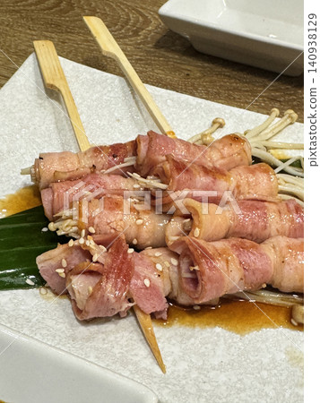 Grilled Bacon Wrapped Enoki Mushroom Skewers With Sweet Sauce Grilled Bacon Wrapped Enoki Mushroom Skewers With Sweet Sauce 140938129