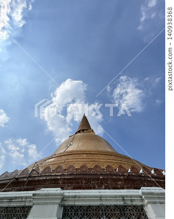 Dynamic Shadow Play On Radiant Phra Pathom Chedi Glazed Wall Dynamic Shadow Play On Radiant Phra Pathom Chedi Glazed Wall 140938368