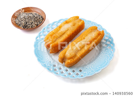milk Flavored Fried Dough Stick Stuffed with Sweet Glutinous Rice Cake Ciba Mochi milk Flavored Fried Dough Stick Stuffed with Sweet Glutinous Rice Cake Ciba Mochi 140938560