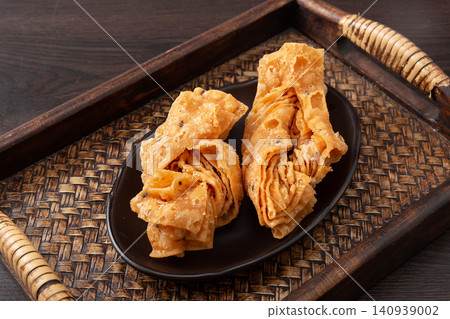 northern Chinese Style Deep Fried Crispy Jiao Ye Pastry, Aromatic Sesame Ribbon Crackers northern Chinese Style Deep Fried Crispy Jiao Ye Pastry, Aromatic Sesame Ribbon Crackers 140939002