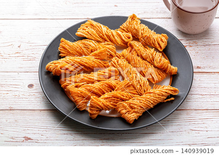 mini Deep Fried Sanzi Twist, Traditional Chinese Small Golden Thread Crispy Pastry mini Deep Fried Sanzi Twist, Traditional Chinese Small Golden Thread Crispy Pastry 140939019