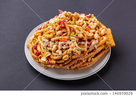 sweet Mongolian Sanzi Pastry Topped with Honey, Roasted Nuts and Dried Fruits sweet Mongolian Sanzi Pastry Topped with Honey, Roasted Nuts and Dried Fruits 140939026