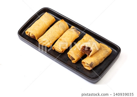 traditional Chinese Spring Rolls Stuffed with Sweet Red Bean Paste Filling 140939035