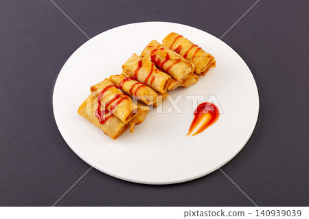 traditional Chinese Spring Rolls Stuffed with Sweet Red Bean Paste Filling traditional Chinese Spring Rolls Stuffed with Sweet Red Bean Paste Filling 140939039
