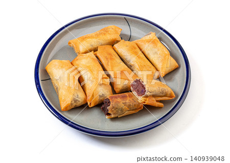 crispy Fried Spring Rolls with Sweet Azuki Bean Paste Filling, Flaky Chinese Pastry crispy Fried Spring Rolls with Sweet Azuki Bean Paste Filling, Flaky Chinese Pastry 140939048