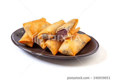 crispy Fried Spring Rolls with Sweet Azuki Bean Paste Filling, Flaky Chinese Pastry crispy Fried Spring Rolls with Sweet Azuki Bean Paste Filling, Flaky Chinese Pastry 140939051
