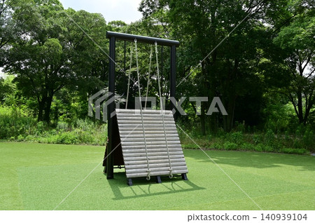 Athletic playground equipment in a nature park Athletic playground equipment in a nature park 140939104