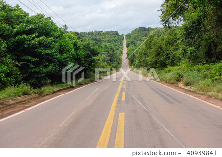BR174 highway, connecting Manaus to Boa Vista in northern Brazil, through Amazon rainforest BR174 highway, connecting Manaus to Boa Vista in northern Brazil, through Amazon rainforest 140939841