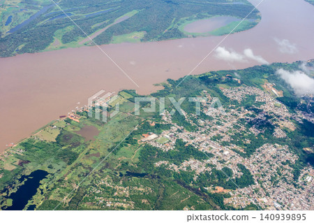 giant Amazonas River seen from above, amidst dense Amazon rainforest. Brazil 140939895