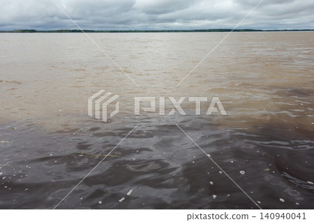 meeting of the waters, junction of Negro river and Amazonas river, in Manaus, Brazil meeting of the waters, junction of Negro river and Amazonas river, in Manaus, Brazil 140940041