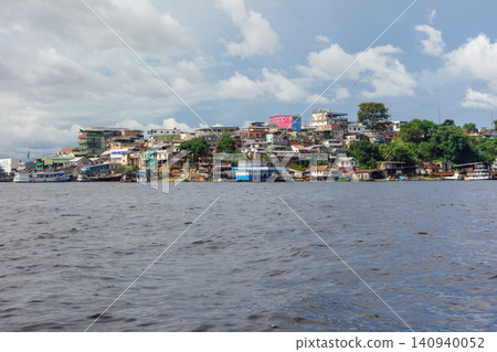 Riverside community on hill along banks of Rio Negro in Manaus, Amazonas, Brazil Riverside community on hill along banks of Rio Negro in Manaus, Amazonas, Brazil 140940052