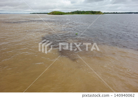 meeting of the waters, junction of Negro river and Amazonas river, in Manaus, Brazil meeting of the waters, junction of Negro river and Amazonas river, in Manaus, Brazil 140940062